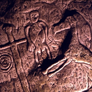 CAVE ART- TEMPLAR CAVE, ROYSTON Bas-relief image of a prancing horse, sword and various