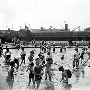 Children bathing in London Wapping Park. 1933