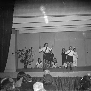 Children performing on stage in Eynsford, Kent. 1938