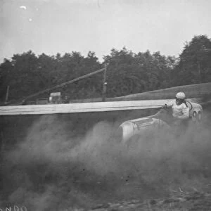 The Crystal Palace miniature car racing grand prix. Frank Chiswell skids his car