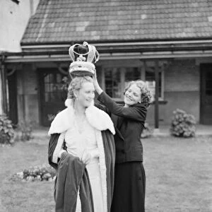 The Dartford Carnival queen trys on the queens gown. 1938