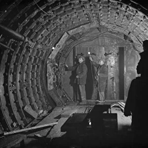 The Dartford tunnel men working on the inner wall shielding. 1938