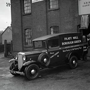 A delivery van from Platt Mill, Borough Green, Kent is loaded up with sacks of flour
