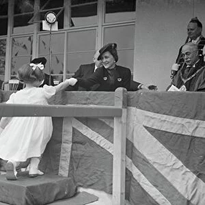 The Duchess of Kent receiving purses from children. 1938