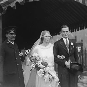 Earl of Straffords niece weds. Mr T T Barnard, MC, Ph D, and Miss G Byng leaving