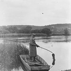 Eel fishing on the Hampshire river Avon 18 August 1920