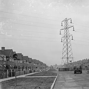 Electricity pylon in the middle of a suburban street, Sidcup. 1935