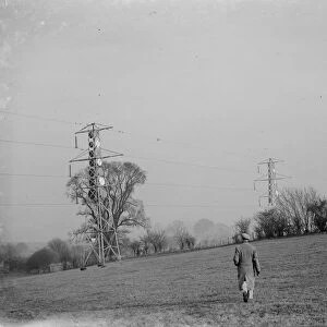 Electricity pylons in Eynsford, Kent. 13 December 1936