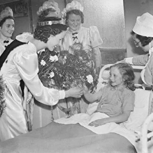 The Erith carnival queen with her attendants visit children at a hospital
