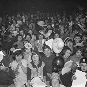 An excited crowd of children at the Swanscombe childrens party. 31 January 1936