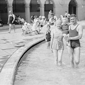 At Finchley Open Air Baths Frank Mose ( Arsenal Football Cub ) with his wife