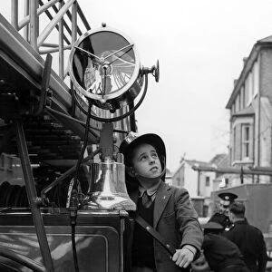 Fireman for a day Bernard Meaden, aged 10, of Bromley, Kent, has a thrill in his