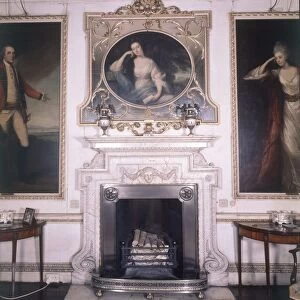 Firle Place in Sussex - drawing room chimney piece with portraits ?TopFoto