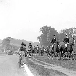 Girl cyclists watch the Royal Artillery (RA) drag hunt at Green St Green, Kent. 1934
