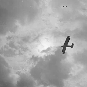 Handley Page bomber at Hendon air force shown in silhouette to the clouds