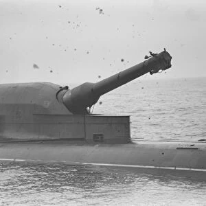 HMS Submarine No 3 During her sea trials in the North Sea. Her 12 inch gun is