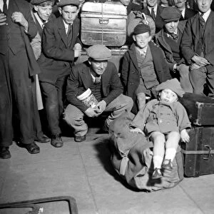 Hop pickers at London Bridge station going to Kent. 1933