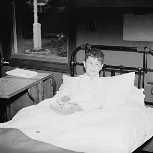 Now in his hospital bed, JW Davies, found on the electric line at Barnehurst