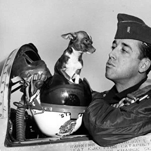 Hows about a little kiss, Chihuahua? First Lt James A Mills, of Charlotte, North