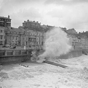 Huge waves broke over the front at Hastings during a Gale, which ravaged the south coast