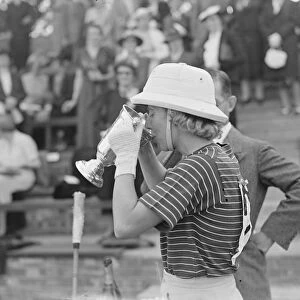 Hurlingham Ladies Polo. Hon Mrs Gurdon ( Grinsthorpe ) takes a drink from the