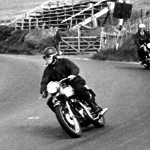 Isle of man, United Kingdom: wearing black leather racing gear, Lord Snowdon, husband