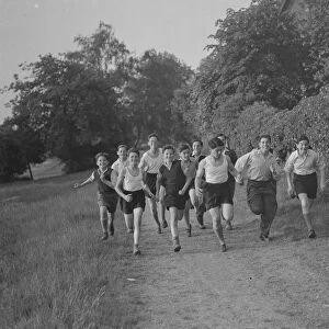Jewish refugees running in the fields of Chislehurst, Kent. 1939