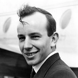 John Surtees, Briatins ace motor-cyclist, seen before he left London Airport for Milan