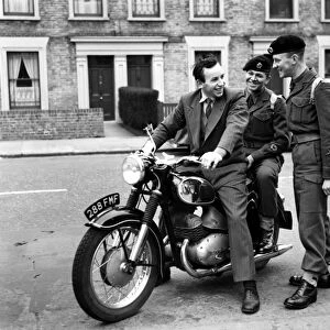 John Surtees, international motor cyclist from Forest Hill, London, was approached
