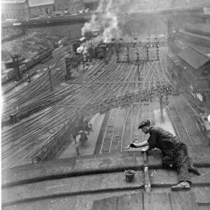 Kings Cross Station - cleaning the roof August 1932