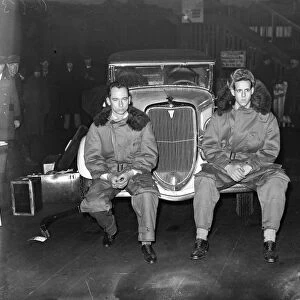 Lt Joels Thorne, driver and Mr Jogn V Oliveau ( left ) mechanic with car to enter