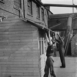 Making a shed at the at the G Ellis joinery works in Hackney. 7 April 1938