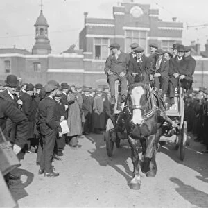 March of ex - soldiers from Woolwich Arsenal to see the Premier. Wounded men leaving