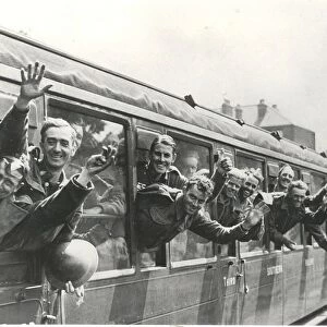 Men of the British Expeditionary Force returning from the Flanders evacuation, give