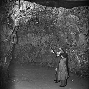 Men inside the Chislehurst caves at the explosive stores. 1938