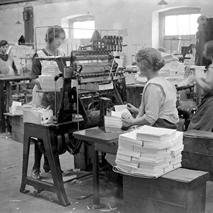 At Messrs James Burns Book Binding works at Esher. Machine sewing. 15 May 1923