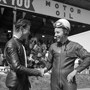 Mettet, Belgium : Britains famous John Surtees ( right ), who with his M V Augusta