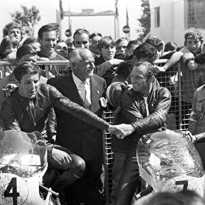 Mike Hailwood won the 250 cc lightweight Tourist Trophy which opened the solo events