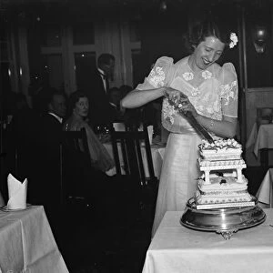 Miss Brands party in Southend, Essex. Cutting the cake. 1938