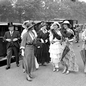 Miss Briget Thomas (centre in white) with other guests arriving for the Royal Garden