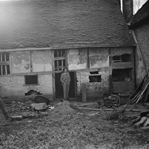 Mr Greenfield at an old dilapidated cottage, wich is to be used as a museum in Eynsford