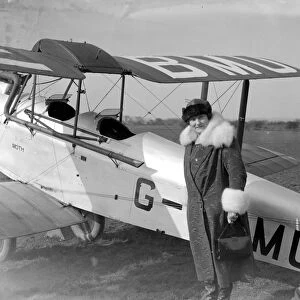Mrs Alan Cobham leaving Stag Lane Aerodrome to meet her husband in mid air. 13 March