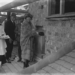 Mrs Holman, daughter of Sir Jesse and Lady Boot lays the foundation stone of the