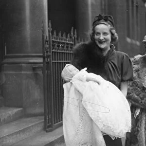 Mrs W F Dundas and her infant daugher after the christening at St Colombas Pont