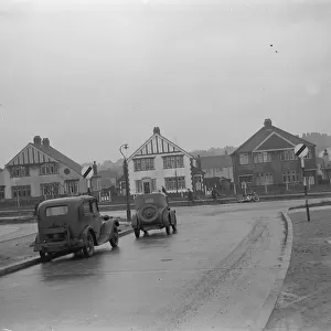 National speed limit signs at a T junction in Rochester, Kent. 1939