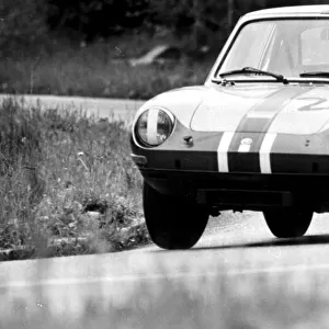 The new 1, 000. c. c. Racer-team sports car by bertone of Italy seen in action during