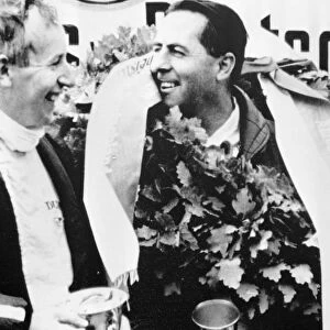 Nurburgring West Germany Jack Brabham chatting with John Surtees and Jochen Rindt