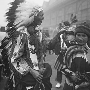 Original caption: Arrival of Red Indians in London. To appear at Olympia Circus