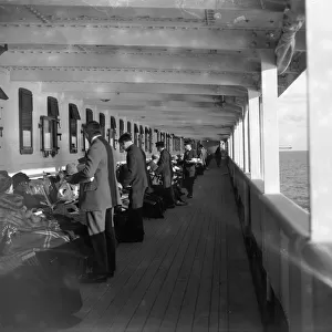 Passengers being served tea on the deck of the RMS Adriatic