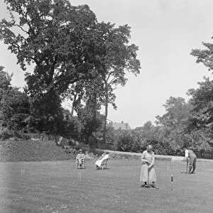 Playing croquet on the lawns at Oakhill. 1928